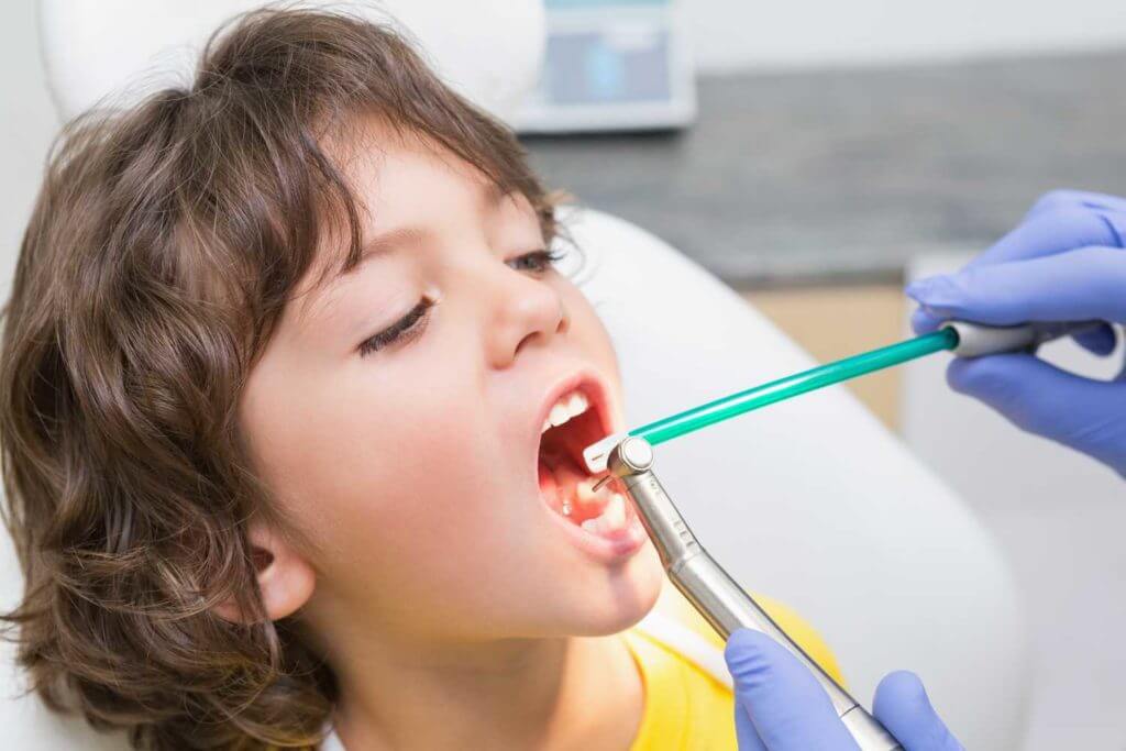 when should i take my child to the dentist for their first visit?